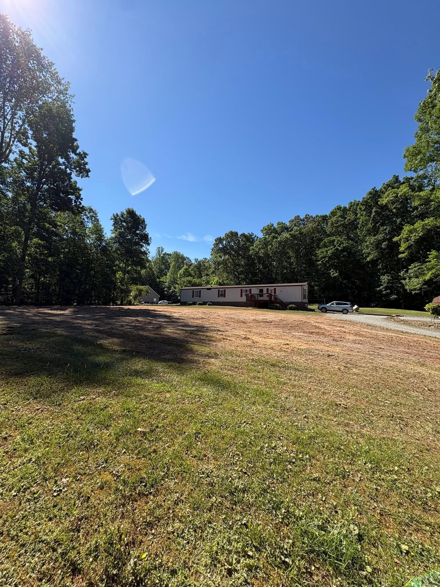 Cleared lot after tree and land clearing — June 2026
